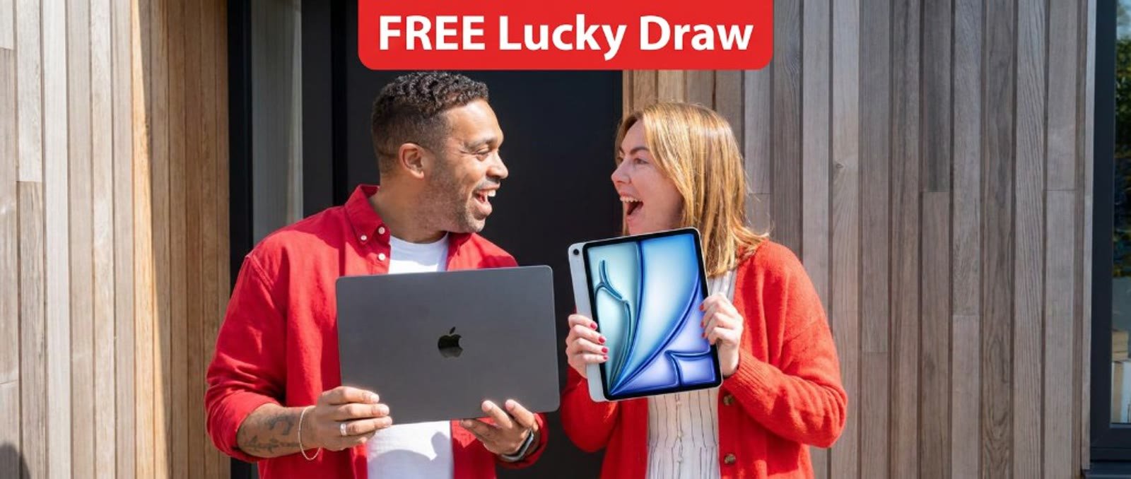 Winners with iPad and MacBook prizes